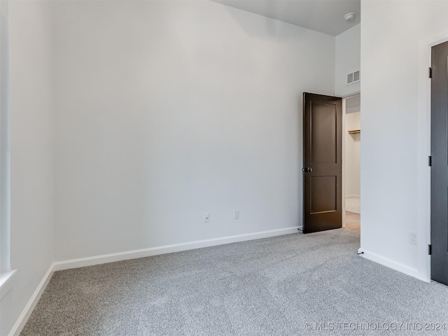 spare room with carpet flooring