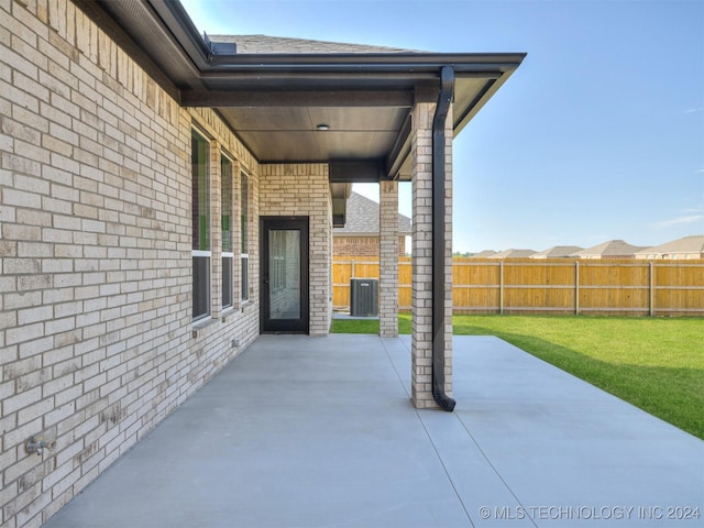 view of patio featuring cooling unit