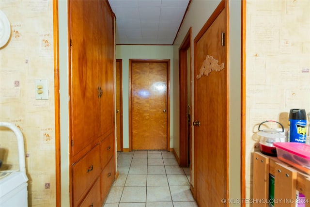 hallway with light tile patterned floors