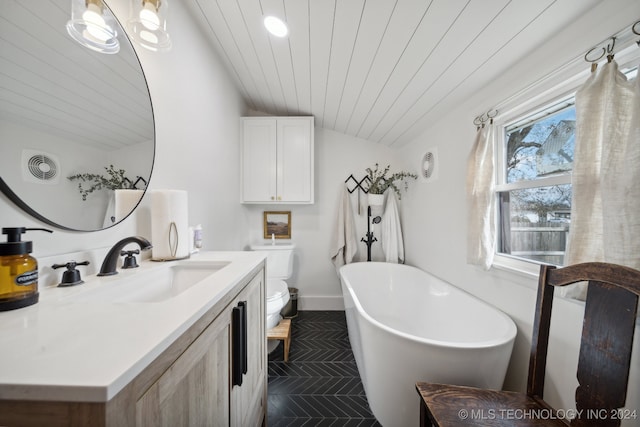 bathroom with a bathtub, vanity, vaulted ceiling, toilet, and wood ceiling