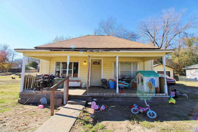 bungalow featuring covered porch