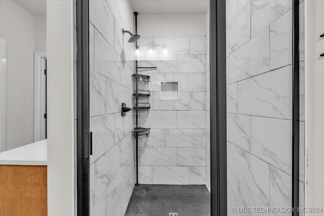 bathroom featuring an enclosed shower