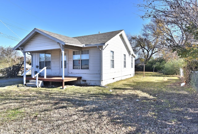 view of front of home with a front lawn and a porch