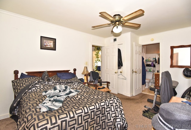 bedroom with ceiling fan, crown molding, and carpet