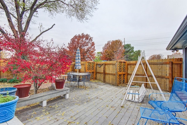 exterior space featuring a wooden deck