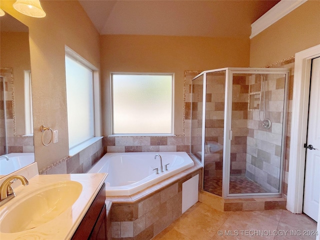 bathroom featuring tile patterned floors, plus walk in shower, and lofted ceiling