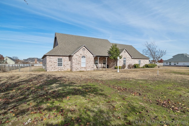 view of front of property with a front lawn