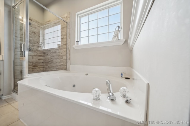 bathroom featuring tile patterned floors and plus walk in shower