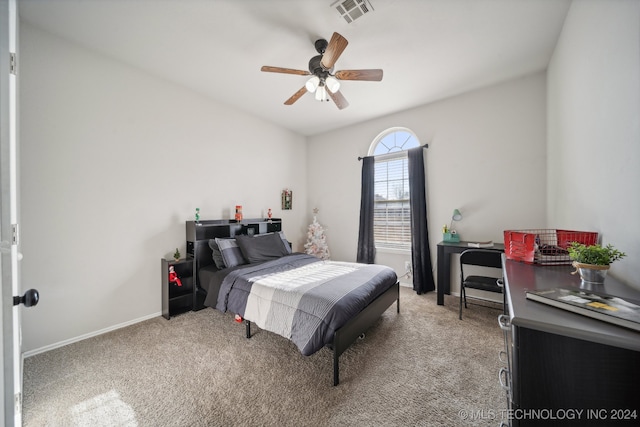 bedroom with ceiling fan and carpet floors