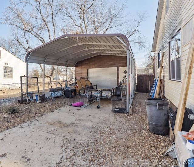 view of parking / parking lot with a carport