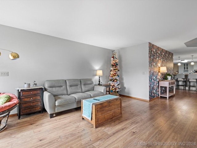 living room with light hardwood / wood-style flooring