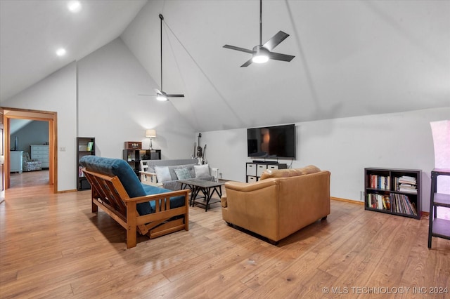 living room with ceiling fan, high vaulted ceiling, and light hardwood / wood-style flooring