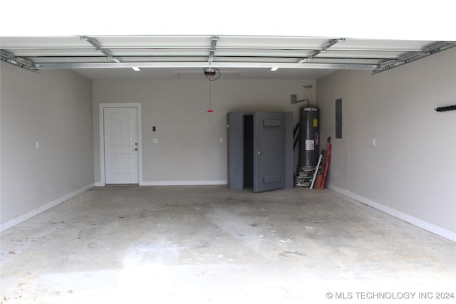 garage with electric water heater and electric panel