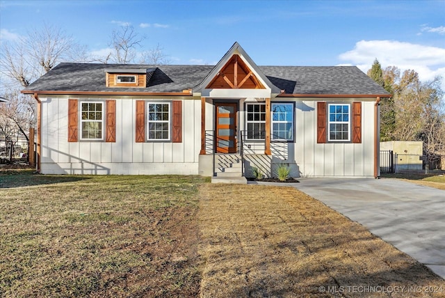 view of front of home with a front yard