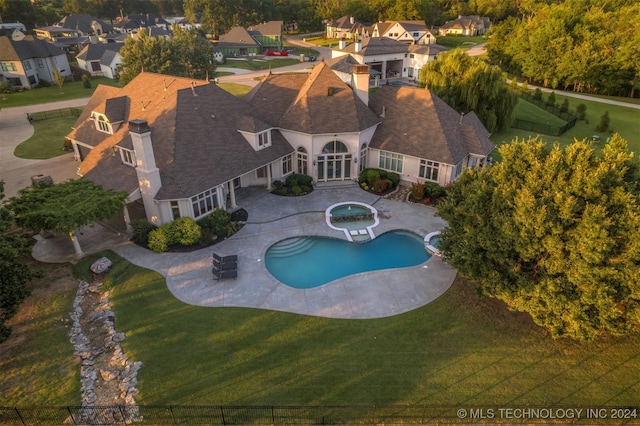 3520 W 77th St S, Tulsa, OK 74132 - outdoor pool featuring an in-ground hot tub, a fenced backyard, a patio, and a residential view