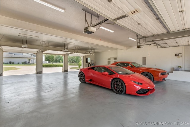 3520 W 77th St S, Tulsa, OK 74132 - garage with electric panel and a garage door opener