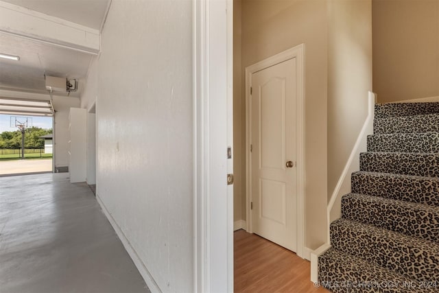 stairway with wood-type flooring