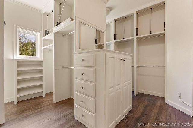 3520 W 77th St S, Tulsa, OK 74132 - walk in closet featuring dark wood-style flooring