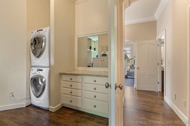 3520 W 77th St S, Tulsa, OK 74132 - washroom featuring crown molding, stacked washer / dryer, and dark wood finished floors
