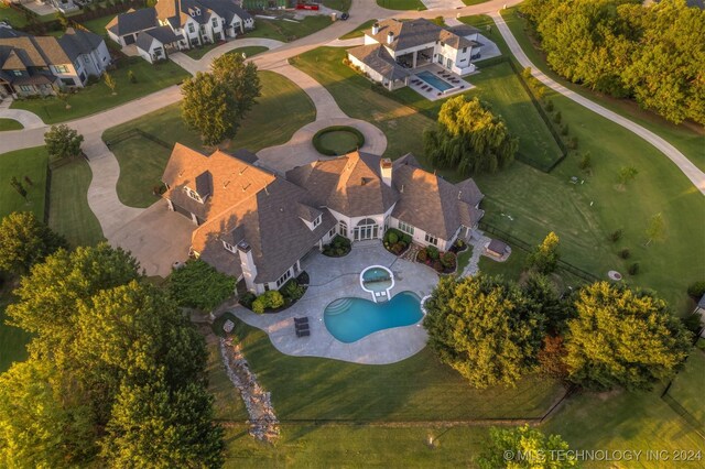 3520 W 77th St S, Tulsa, OK 74132 - aerial overview of property's location with a pool and nearby suburban area