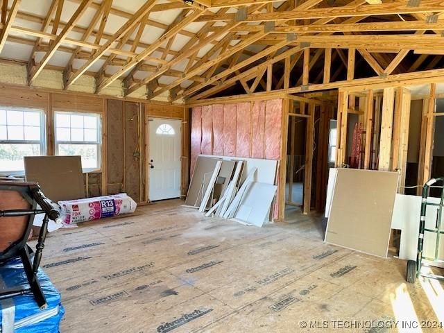 miscellaneous room with vaulted ceiling