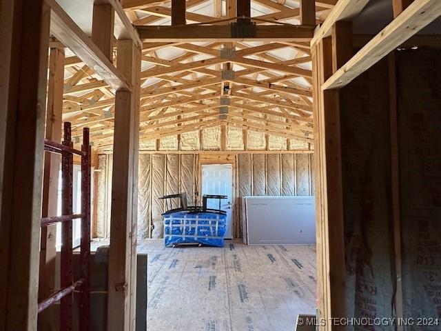 miscellaneous room featuring vaulted ceiling