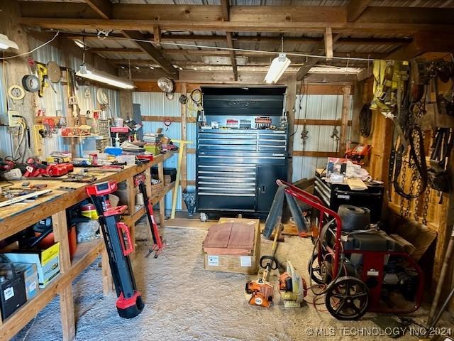 interior space with carpet and a workshop area