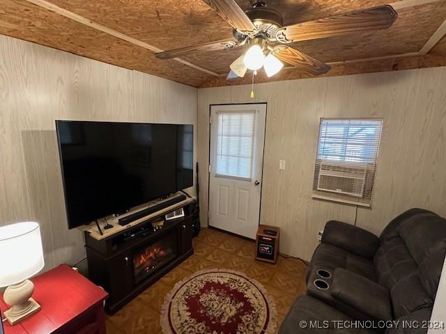 living room with ceiling fan