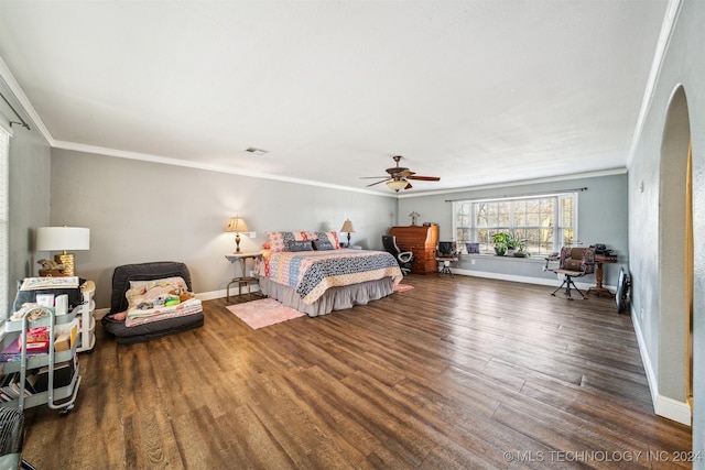 bedroom featuring crown molding, ceiling fan, and dark wood-type flooring