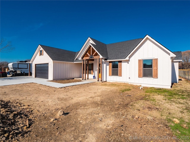 modern farmhouse featuring a garage