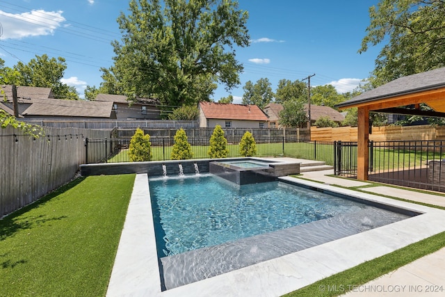 view of pool with an in ground hot tub, a gazebo, a yard, and pool water feature