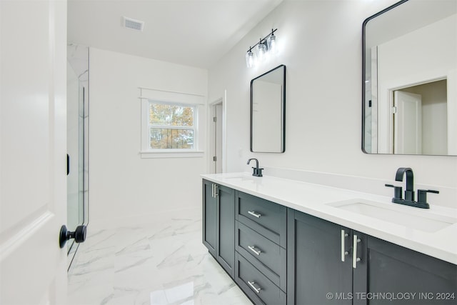 bathroom featuring vanity and an enclosed shower