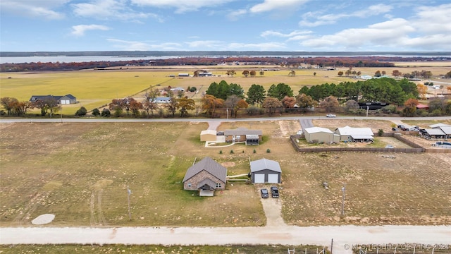 birds eye view of property featuring a rural view