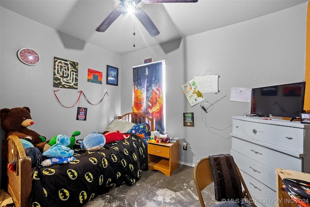 bedroom with concrete floors and ceiling fan