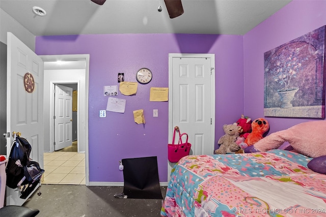 bedroom featuring concrete floors and ceiling fan