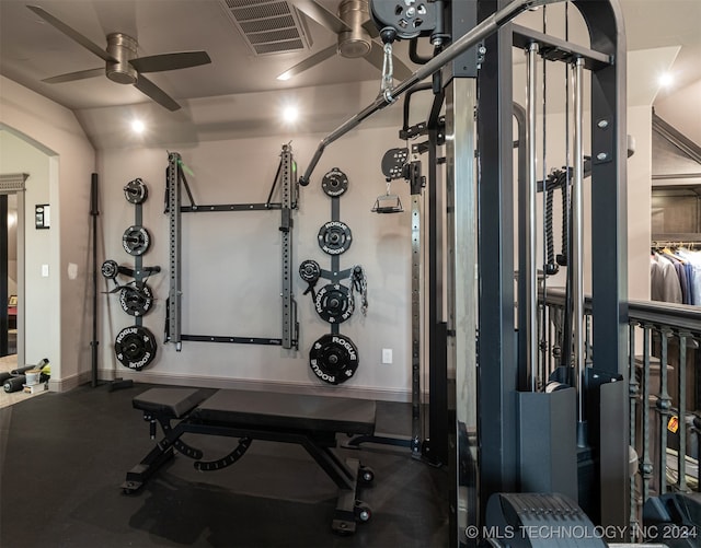 workout area with ceiling fan and lofted ceiling