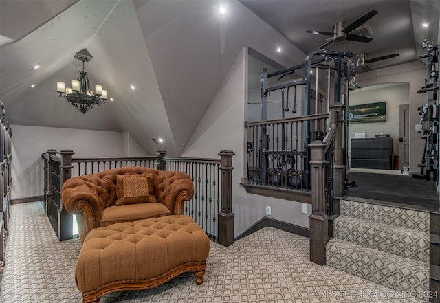 sitting room featuring carpet, ceiling fan with notable chandelier, and vaulted ceiling