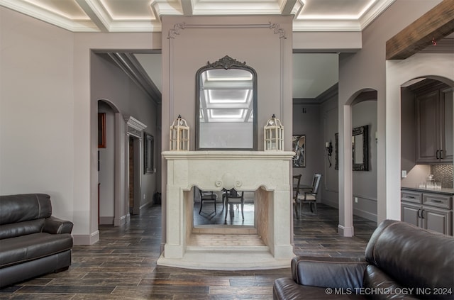 living room with beam ceiling, crown molding, and dark wood-type flooring