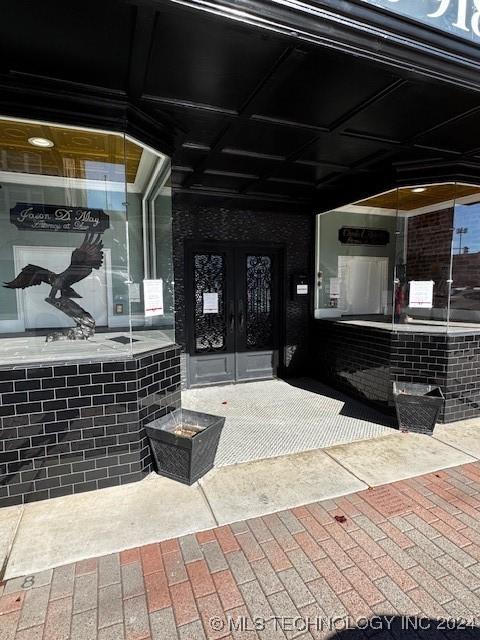 8 W Main St, Ardmore, OK 73401 - view of patio / terrace featuring french doors