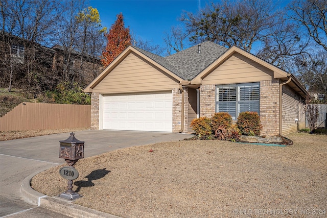 view of front of property featuring a garage