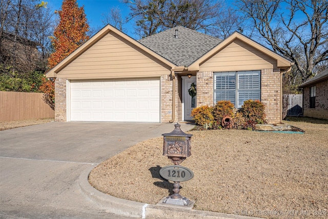 single story home with a garage