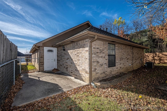 view of outbuilding featuring cooling unit