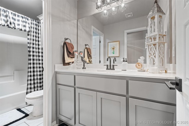 full bathroom featuring shower / bath combination with curtain, vanity, toilet, and tile patterned floors