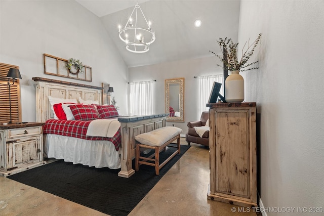 bedroom featuring high vaulted ceiling and an inviting chandelier