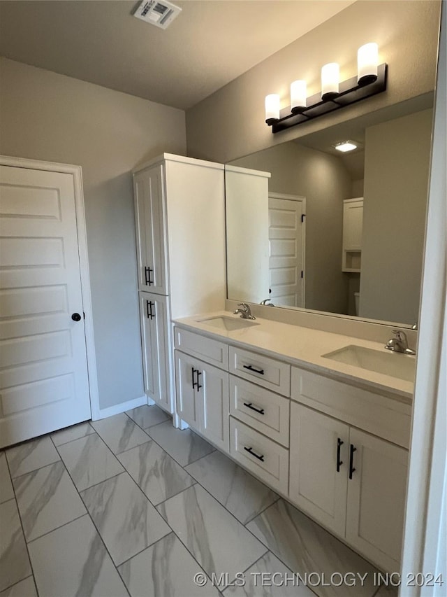 bathroom featuring vanity