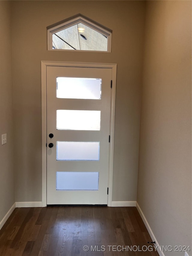 doorway featuring dark hardwood / wood-style flooring