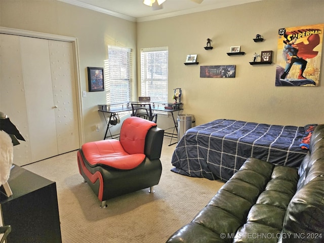 carpeted bedroom with crown molding and a closet