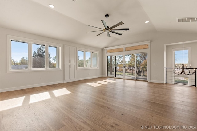 203 E 45th Ct, Tulsa, OK 74105 - unfurnished living room featuring a chandelier, vaulted ceiling, ceiling fan, light wood-style flooring, and recessed lighting