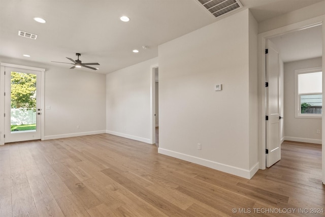 203 E 45th Ct, Tulsa, OK 74105 - unfurnished room featuring plenty of natural light, a ceiling fan, recessed lighting, and light wood-type flooring