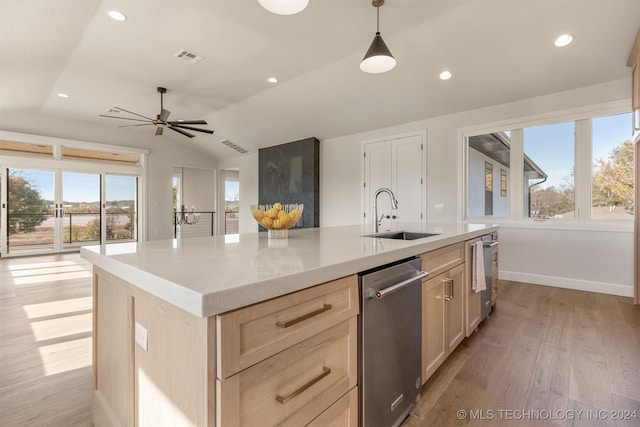 203 E 45th Ct, Tulsa, OK 74105 - kitchen featuring stainless steel dishwasher, vaulted ceiling, plenty of natural light, light wood-style floors, and open floor plan